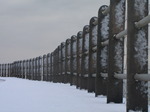 SX12165 Snow on side of pillars of guardrail.jpg